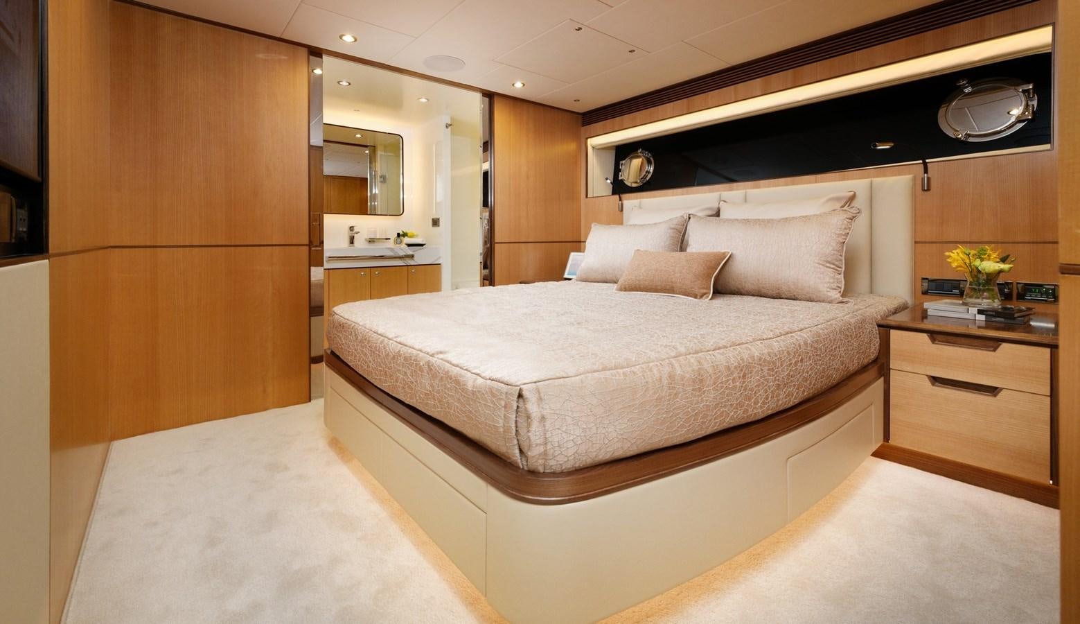 a large bedroom with a large bed aboard CHRISTINE Yacht for Sale