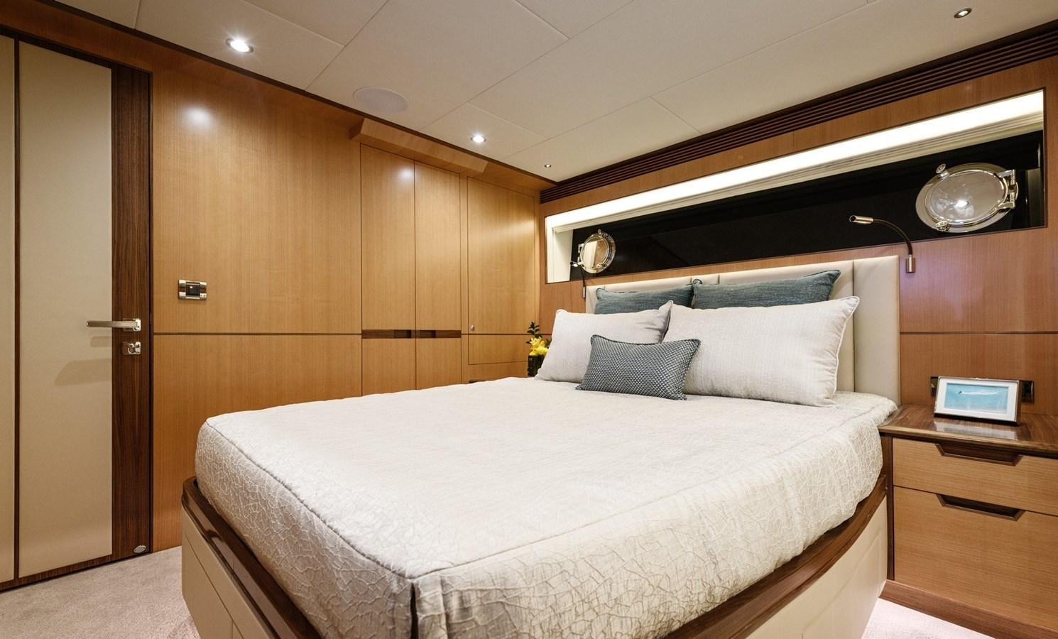 a bed in a room aboard CHRISTINE Yacht for Sale