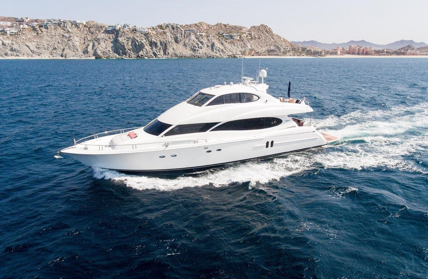 a white yacht in the water aboard LAZZARA 80' Yacht for Sale