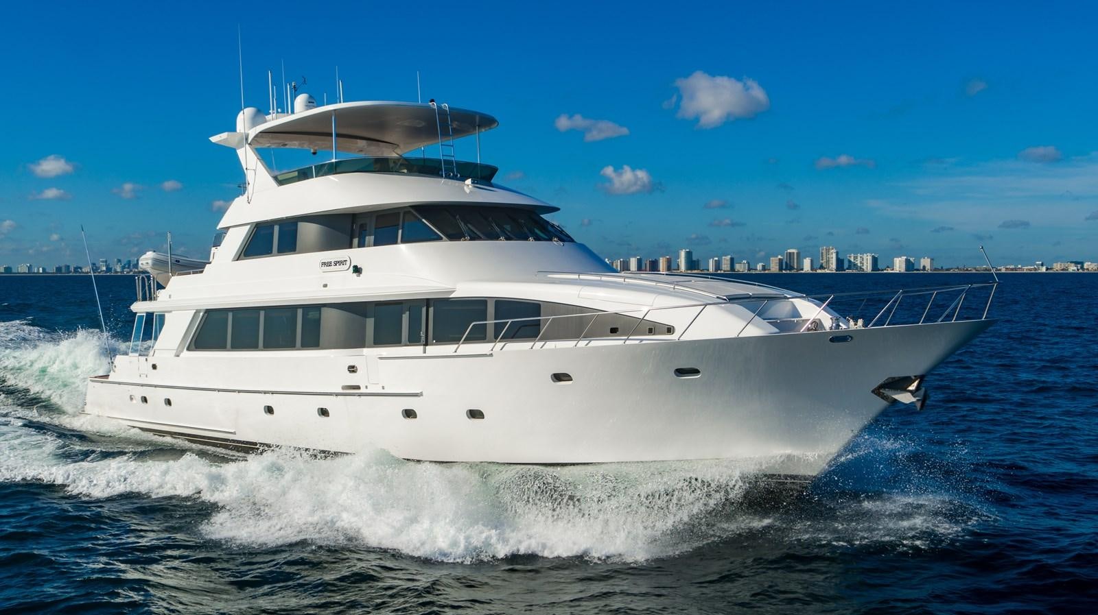 a white yacht on the water aboard SHORT GAME Yacht for Sale