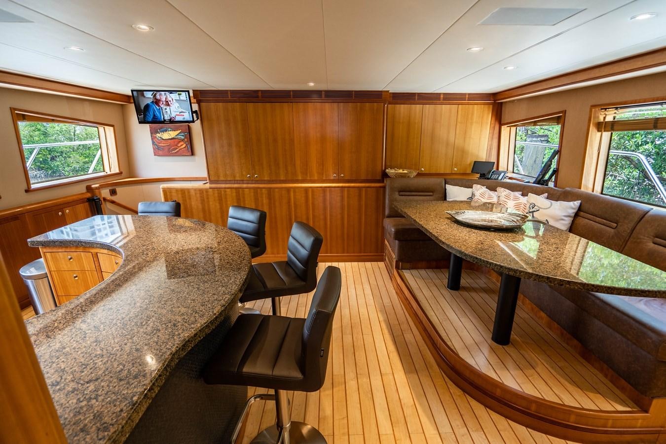 a large dining table in a room aboard SHORT GAME Yacht for Sale