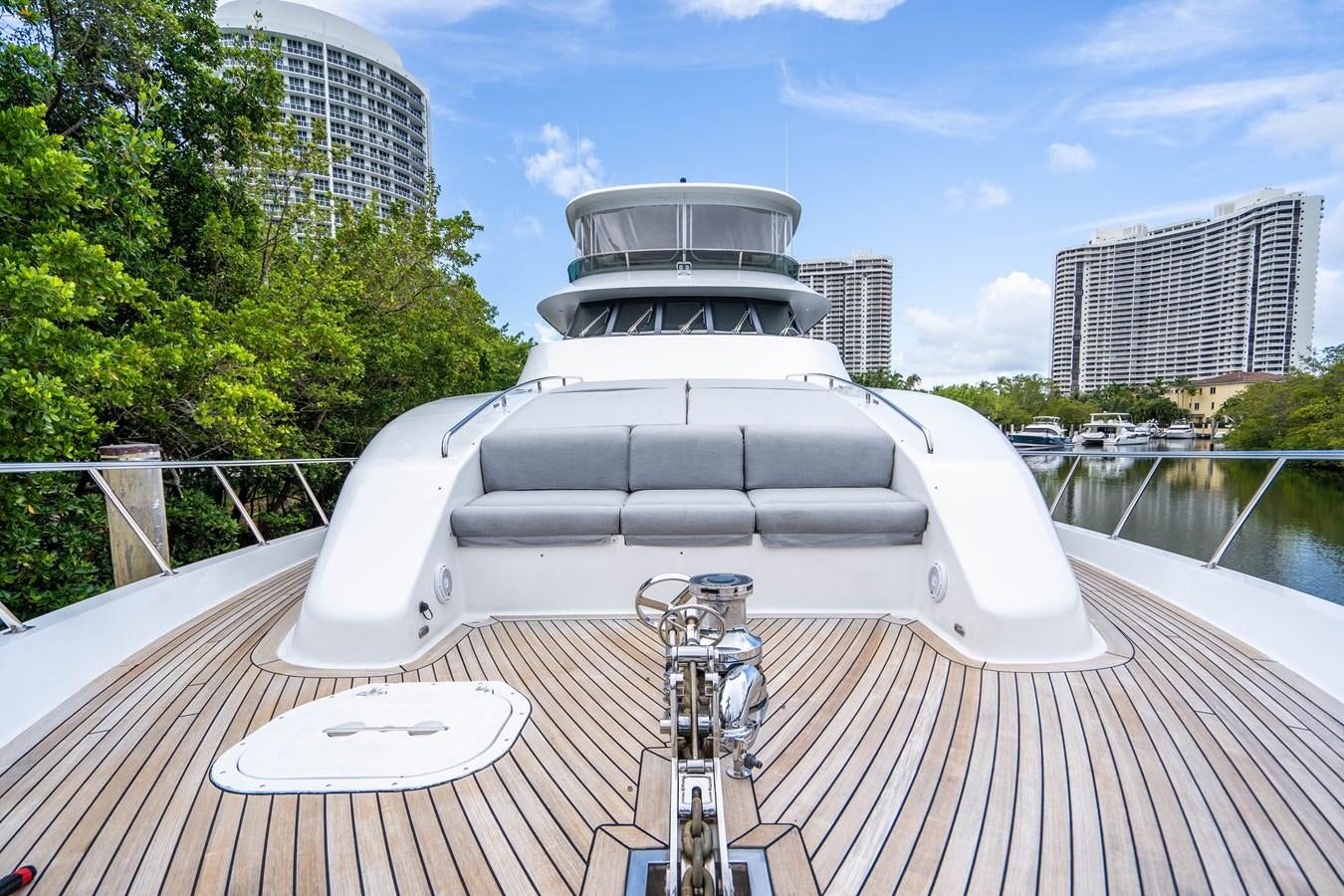a white boat on a deck aboard SHORT GAME Yacht for Sale
