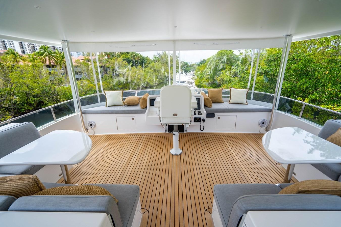 a room with a table and chairs aboard SHORT GAME Yacht for Sale