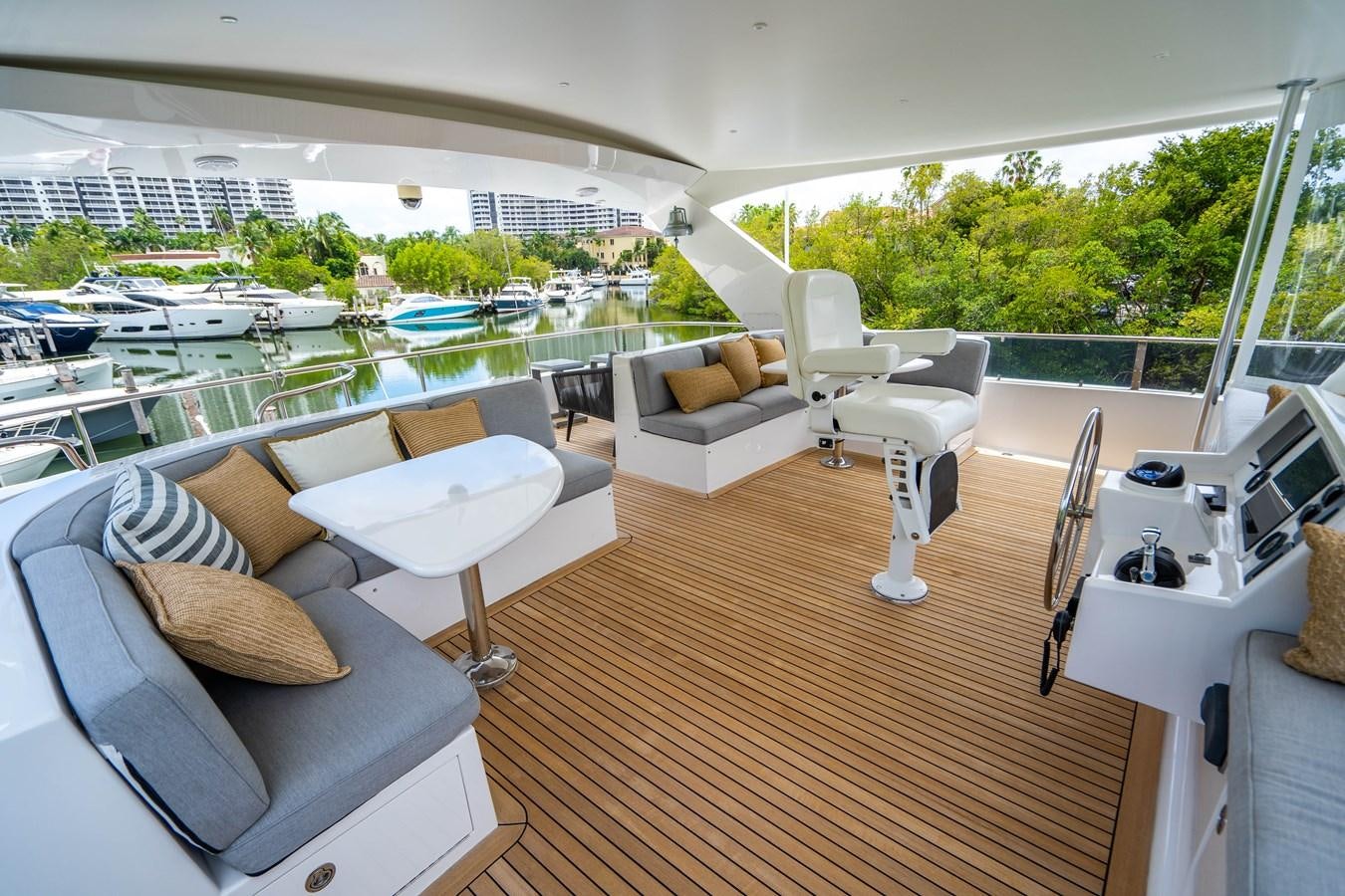 a living room with a large patio aboard SHORT GAME Yacht for Sale