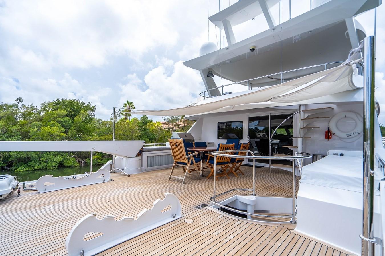 a house with a deck and a pool aboard SHORT GAME Yacht for Sale
