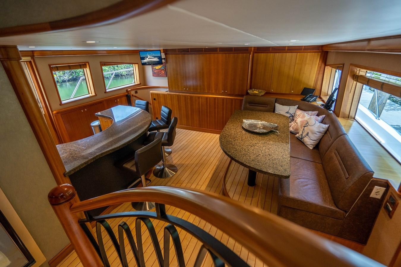 a living room with a couch and a table aboard SHORT GAME Yacht for Sale