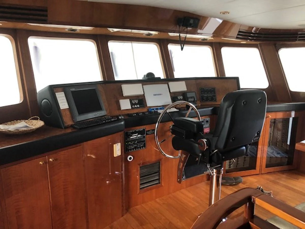 a room with a desk and computer aboard JEF82110L506 Yacht for Sale