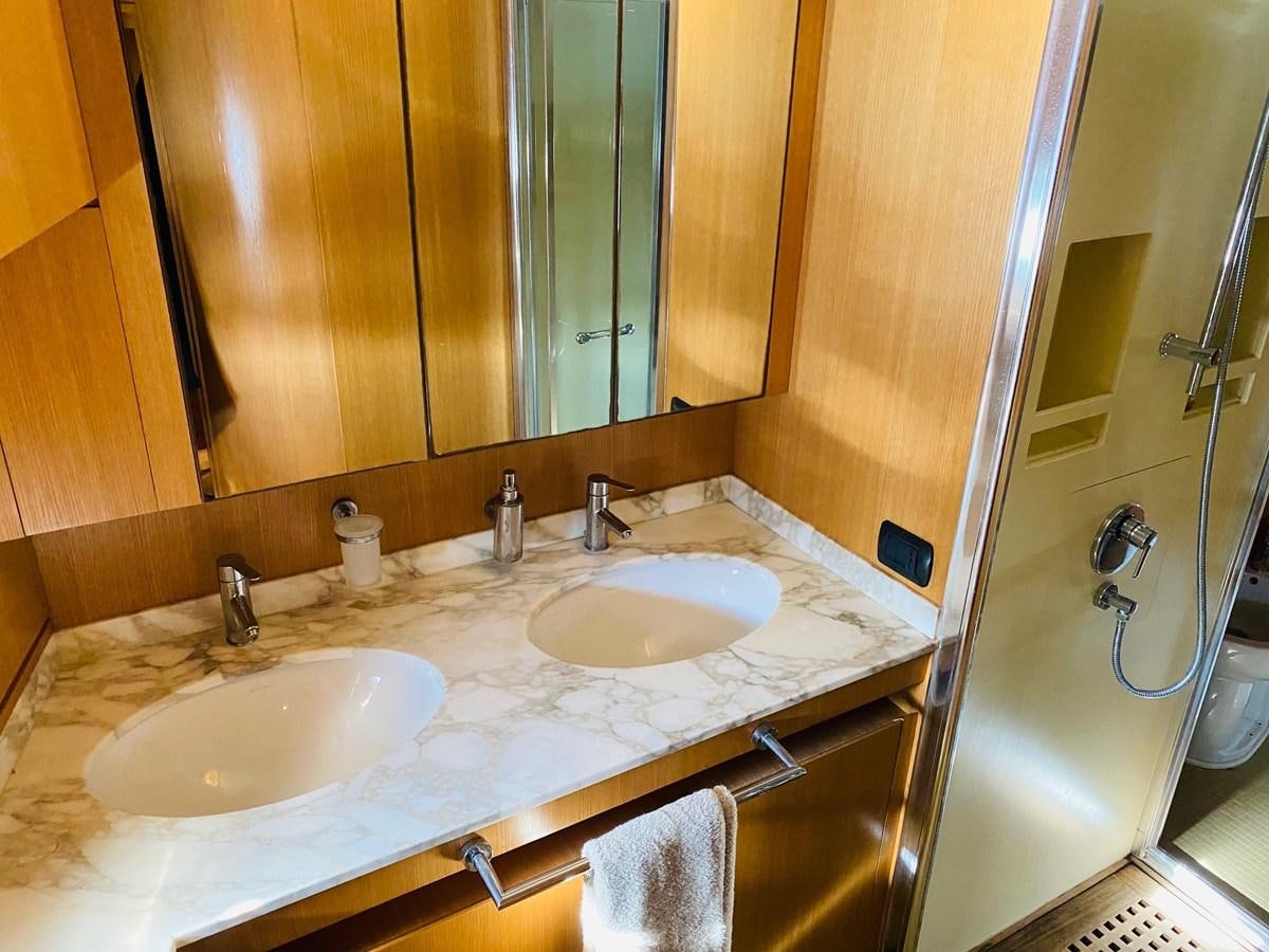 a couple of sinks in a bathroom aboard DEA Yacht for Sale