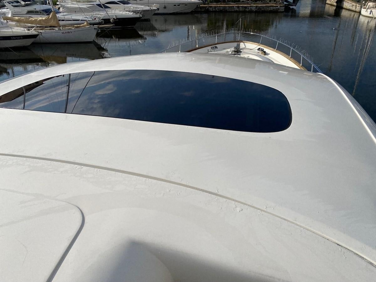 a large pool of water aboard DEA Yacht for Sale
