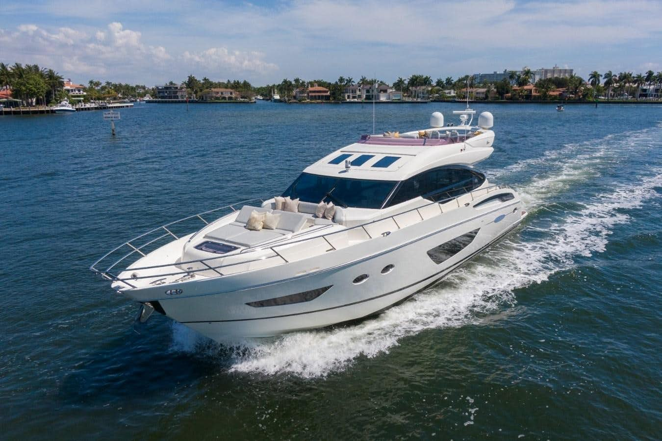 a white yacht on the water aboard SOL INVICTUS Yacht for Sale