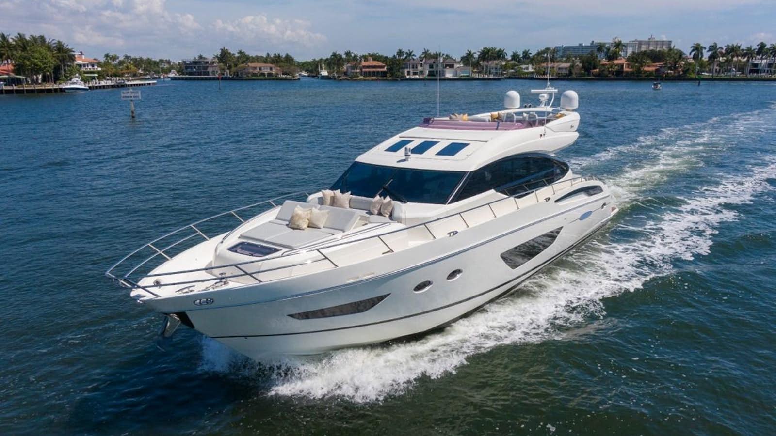 a white yacht on the water aboard SOL INVICTUS Yacht for Sale