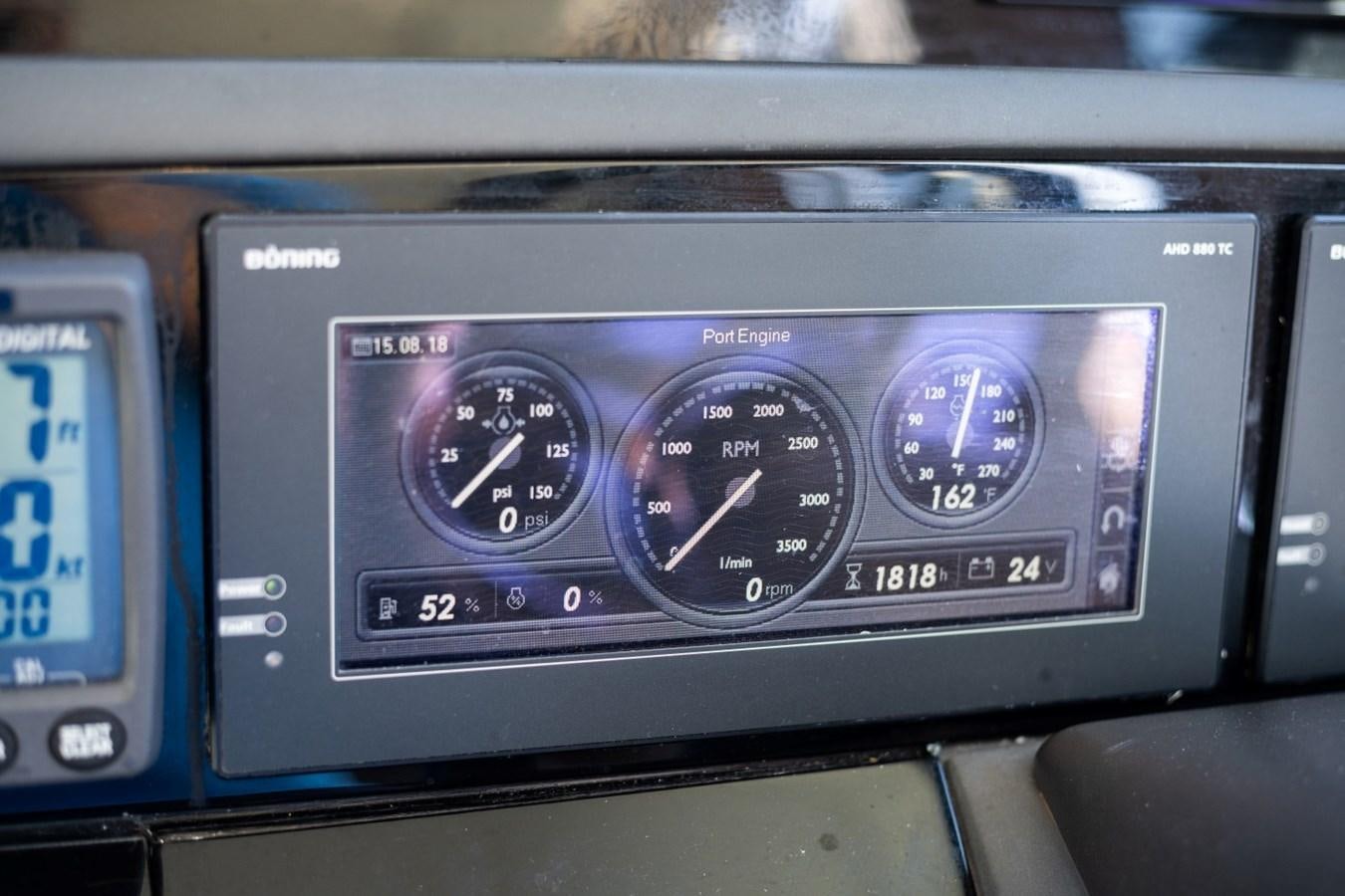 a car dashboard with a digital display aboard SOL INVICTUS Yacht for Sale