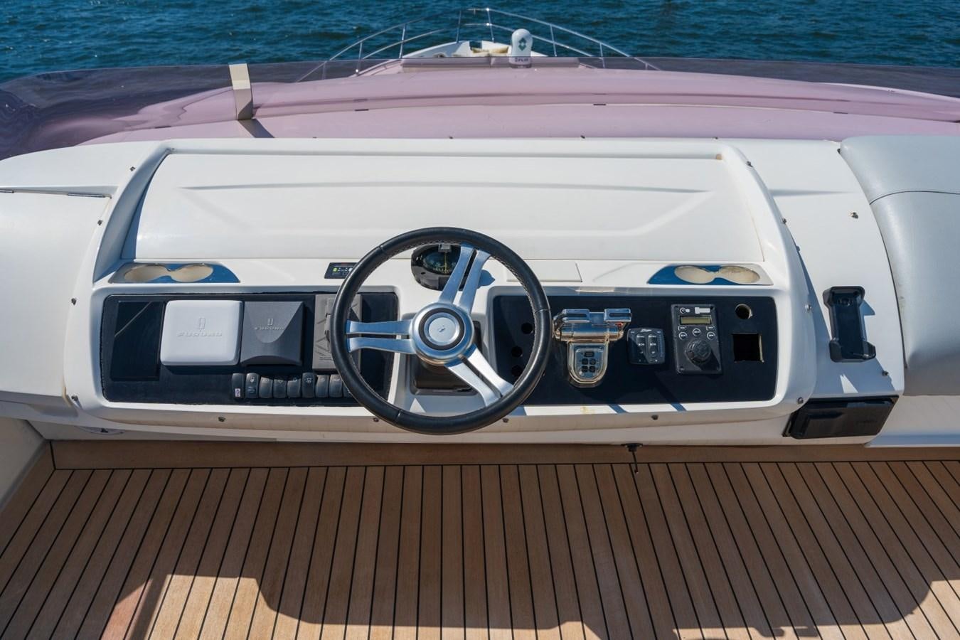 a car on a dock aboard SOL INVICTUS Yacht for Sale