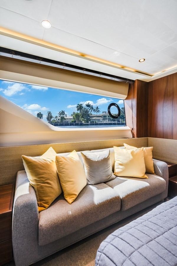 a couch with pillows aboard SOL INVICTUS Yacht for Sale