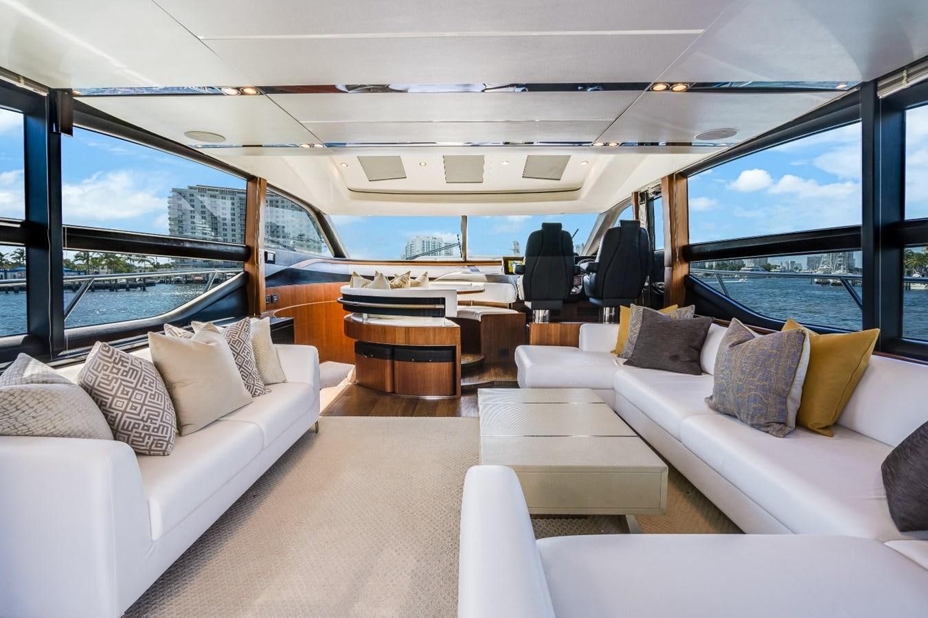 a large room with a couch and a table aboard SOL INVICTUS Yacht for Sale