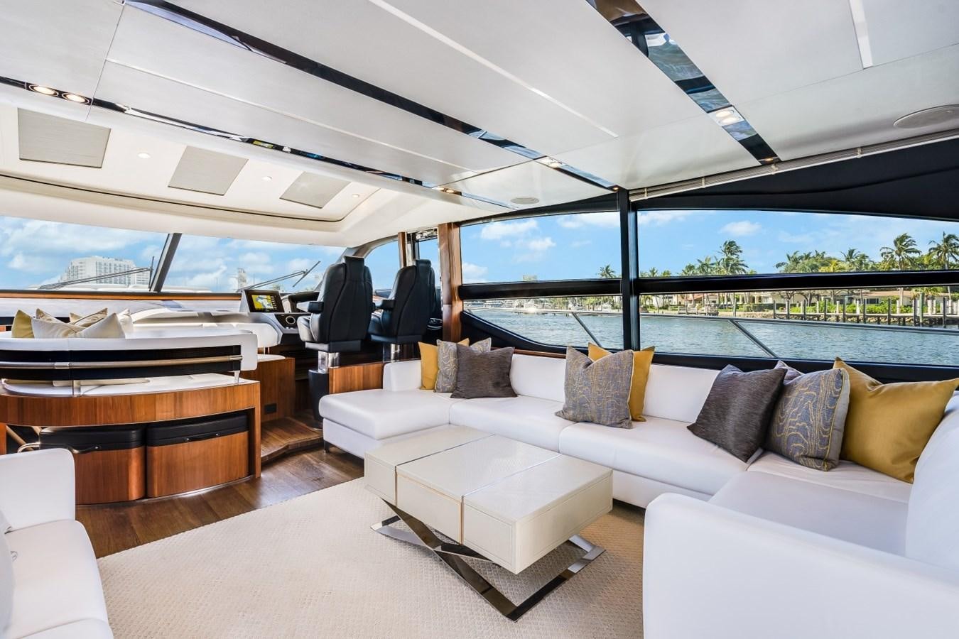 a large living room with a large window aboard SOL INVICTUS Yacht for Sale