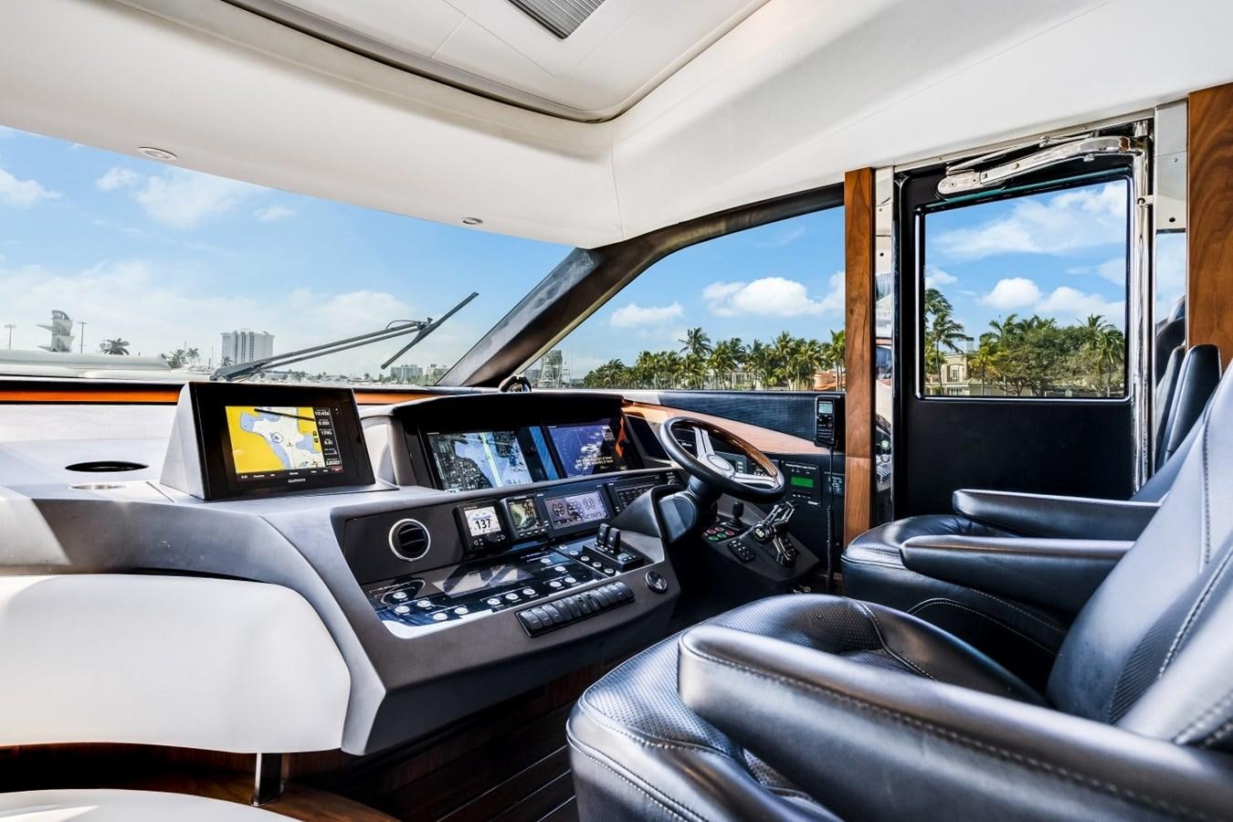 inside of a car aboard SOL INVICTUS Yacht for Sale