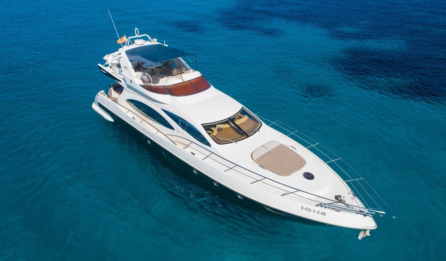 a white yacht in the water aboard FOUNDATION  Yacht for Sale