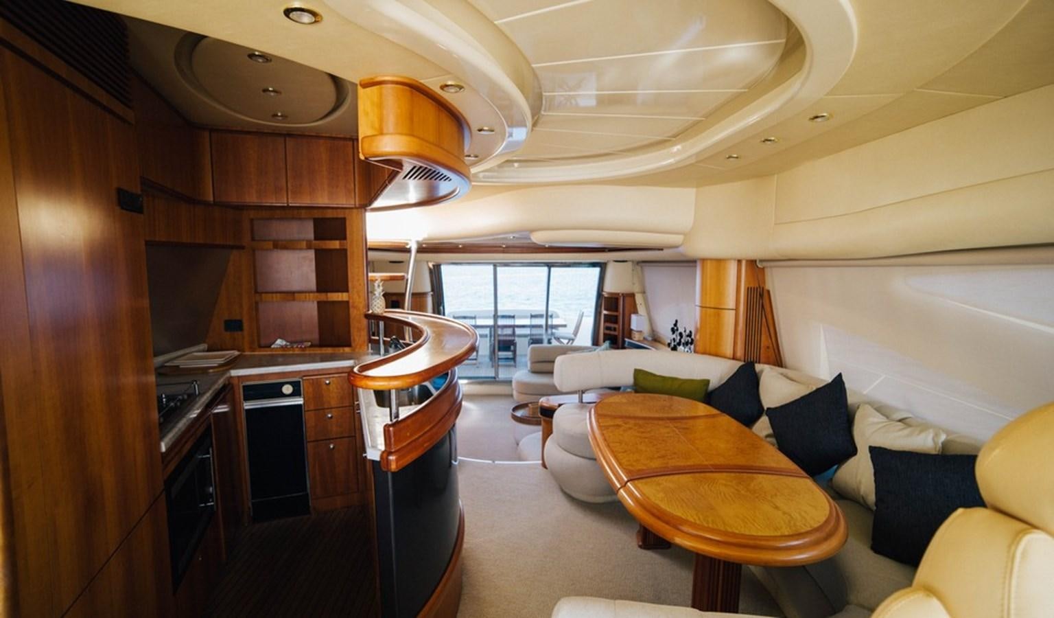 a large room with a table and chairs aboard FOUNDATION  Yacht for Sale