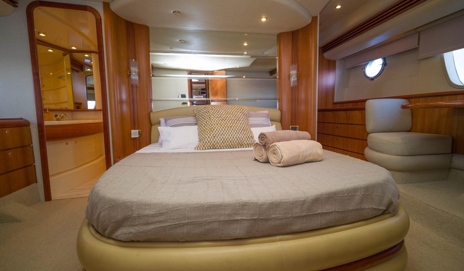 a bed in a room aboard FOUNDATION  Yacht for Sale