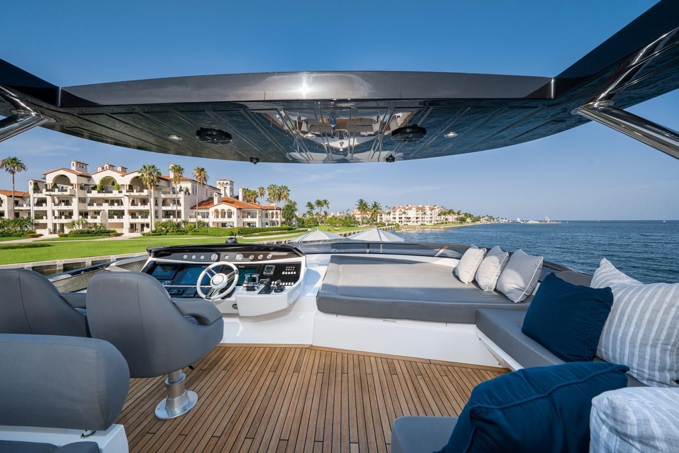 a large swimming pool with a deck and a view of a city aboard 2015 SUNSEEKER 92' Yacht for Sale