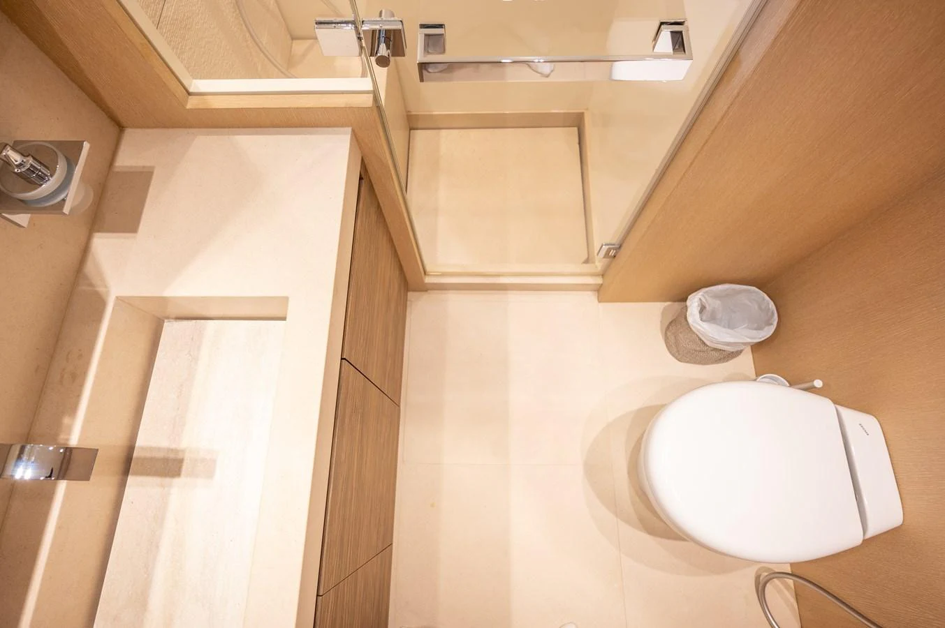 a toilet in a bathroom aboard ASTONISH Yacht for Sale