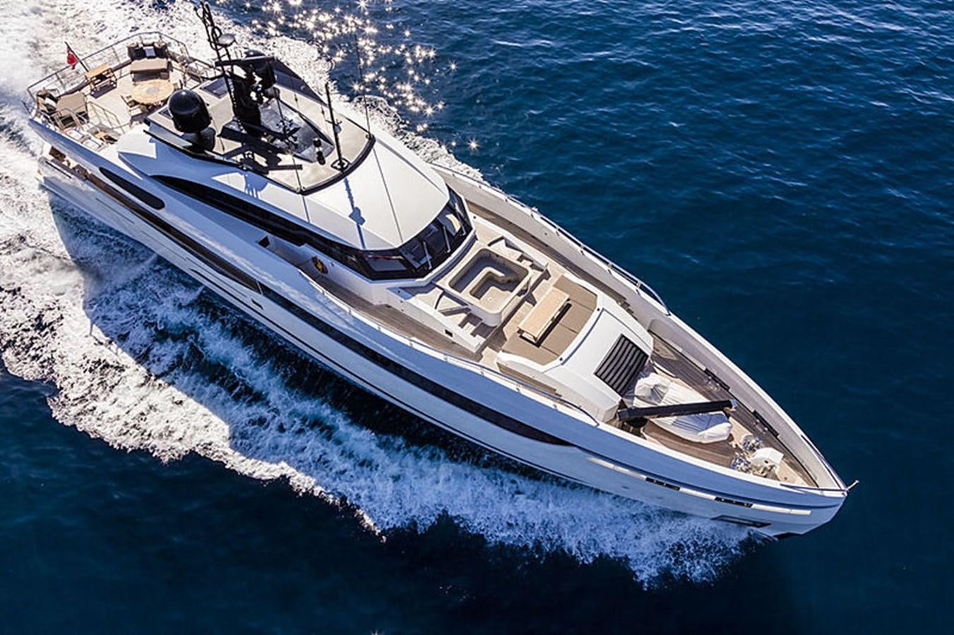 a white boat on the water aboard NEXT Yacht for Sale