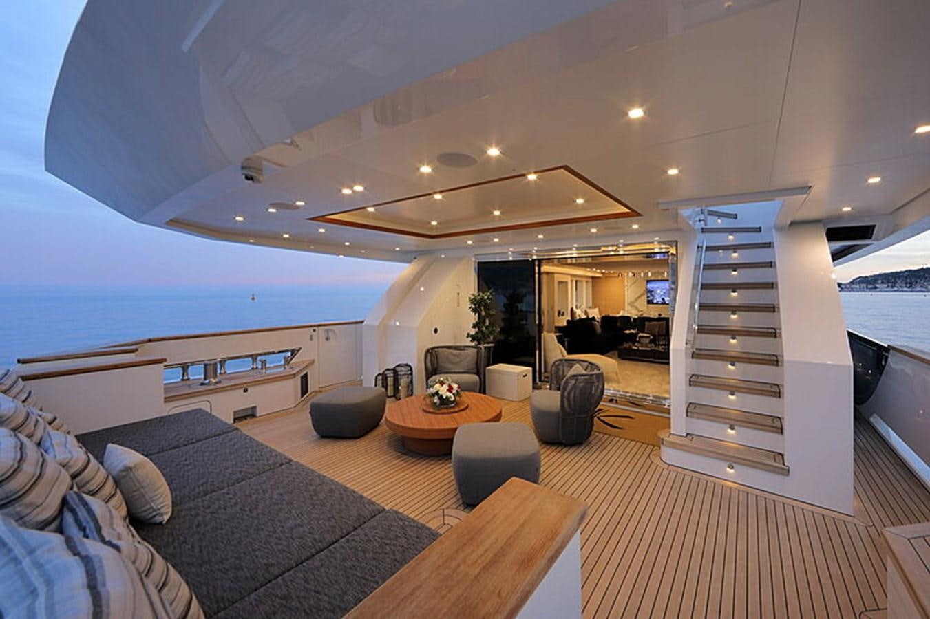 a modern bedroom with a large open roof aboard NEXT Yacht for Sale