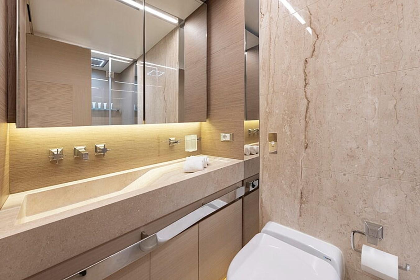 a bathroom with a large mirror aboard NEXT Yacht for Sale