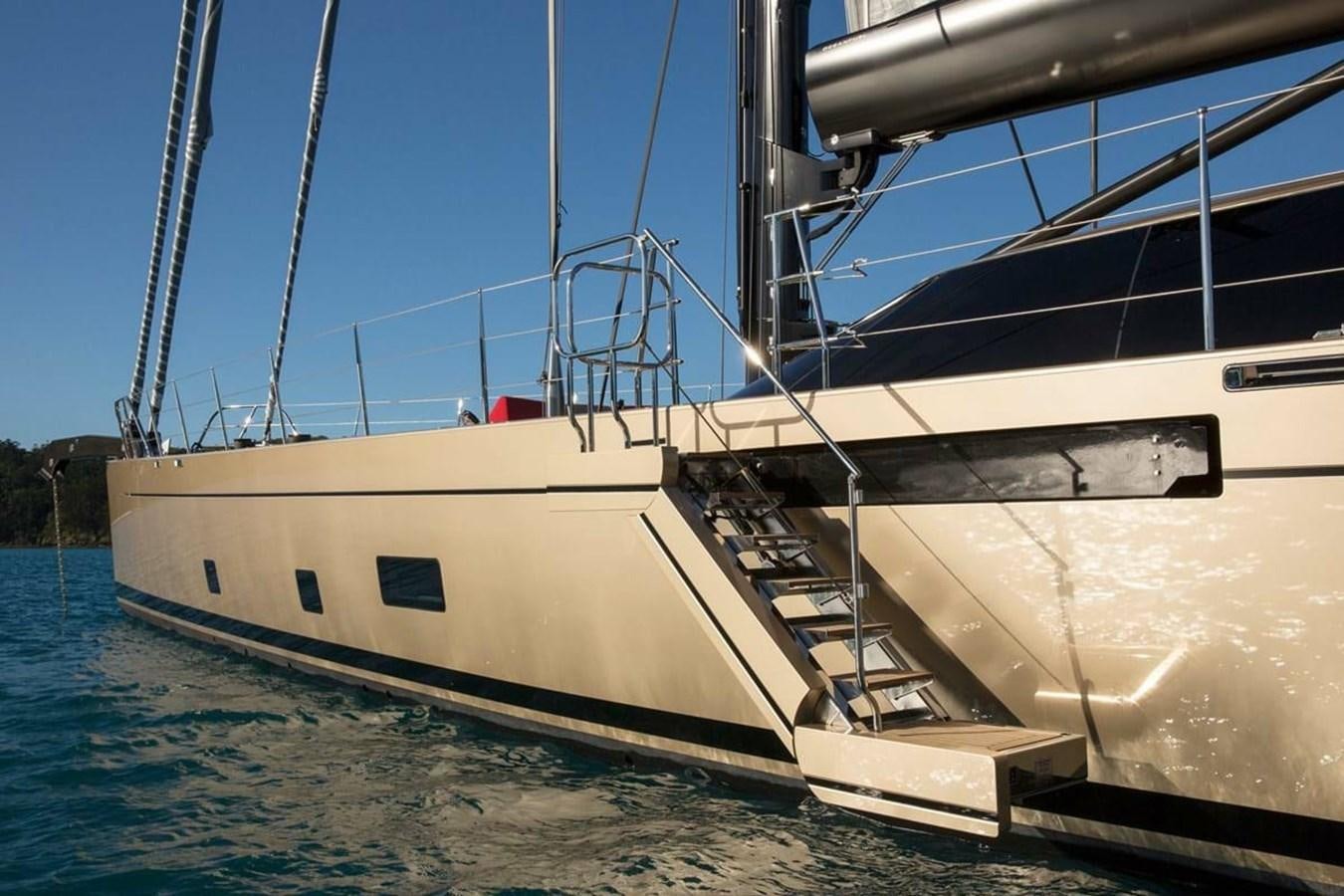 a large white boat in the water aboard ESCAPADE Yacht for Sale
