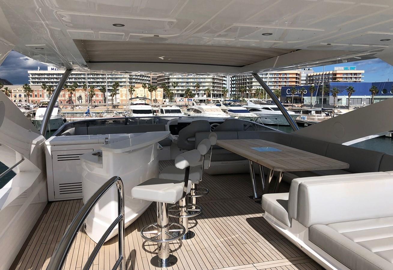 inside of a building with tables and chairs aboard TICKETYBOO Yacht for Sale