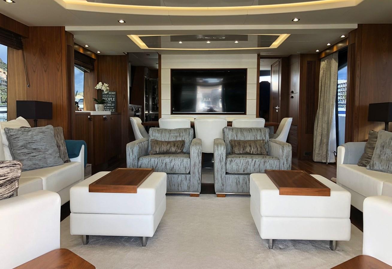 a living room with a large tv aboard TICKETYBOO Yacht for Sale