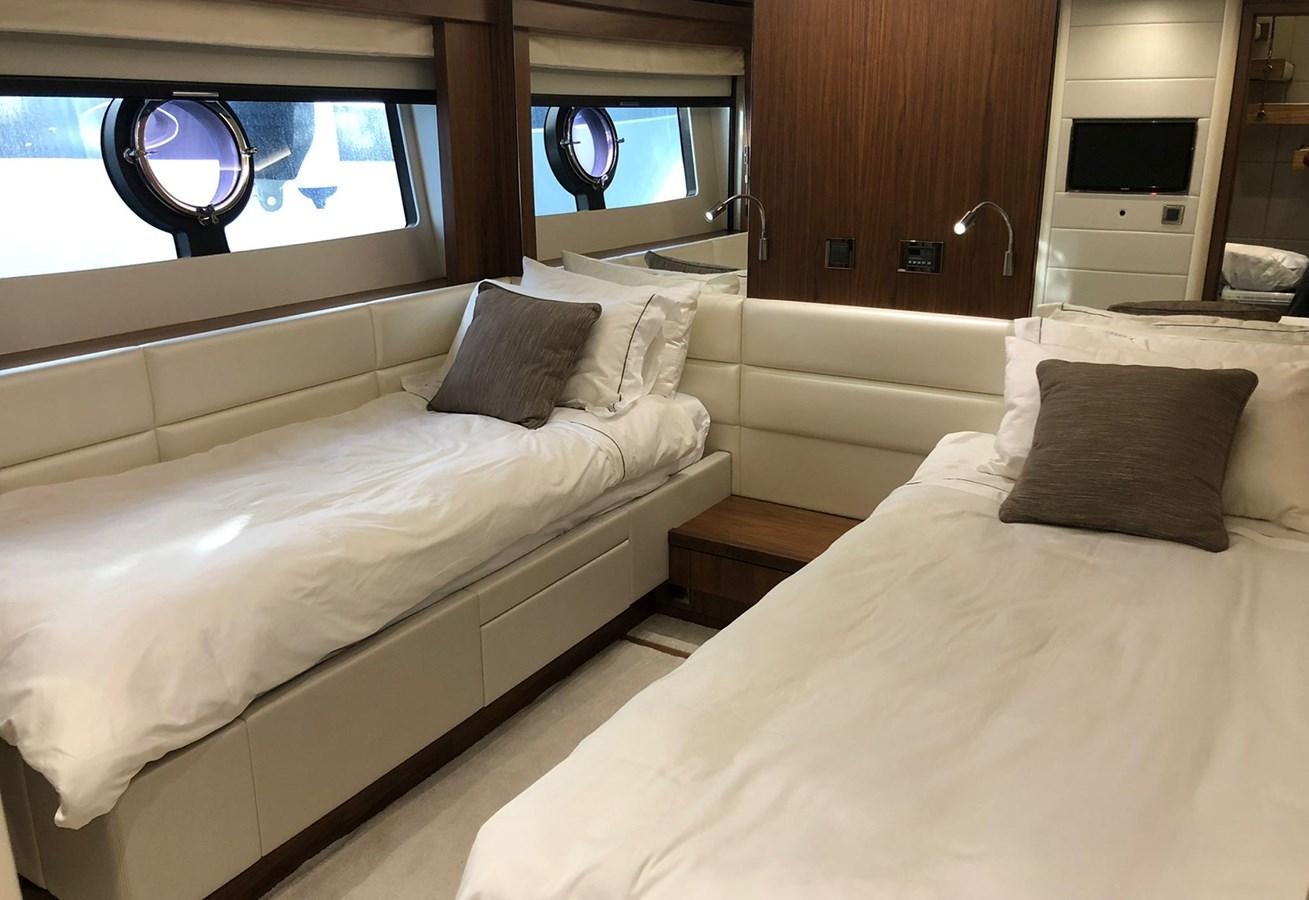 a couple of beds in a room aboard TICKETYBOO Yacht for Sale