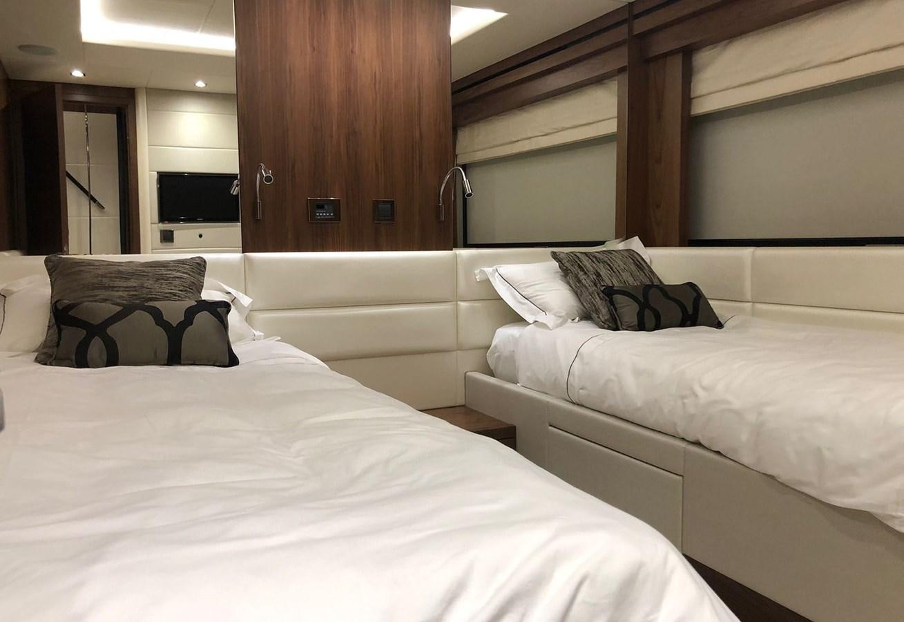 a couple of beds in a hotel room aboard TICKETYBOO Yacht for Sale