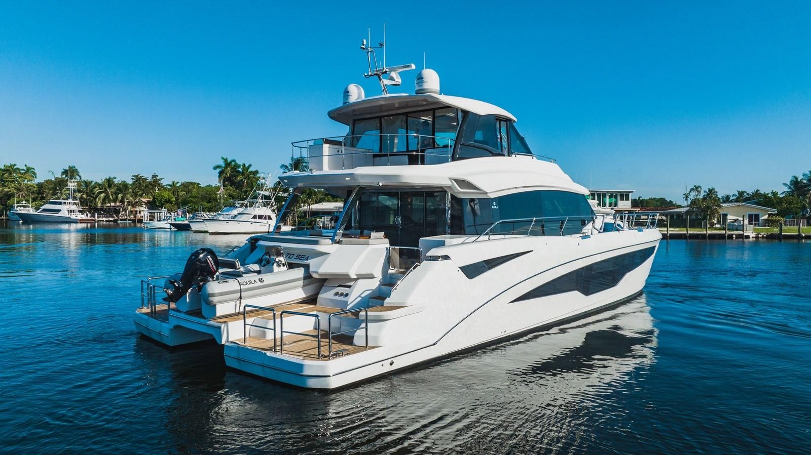 a boat on the water aboard PLANE TO SEA Yacht for Sale