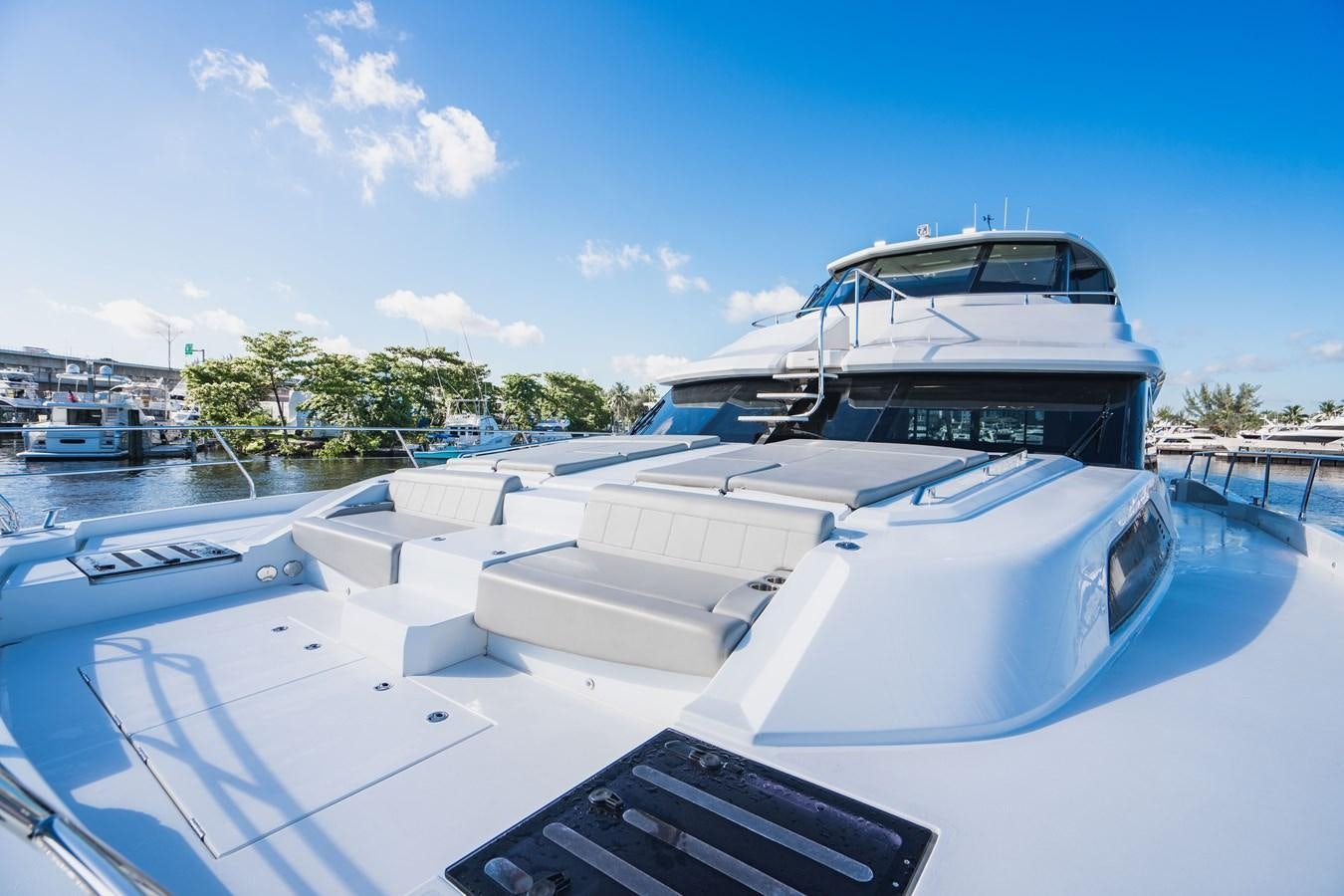 a boat docked at a pier aboard PLANE TO SEA Yacht for Sale