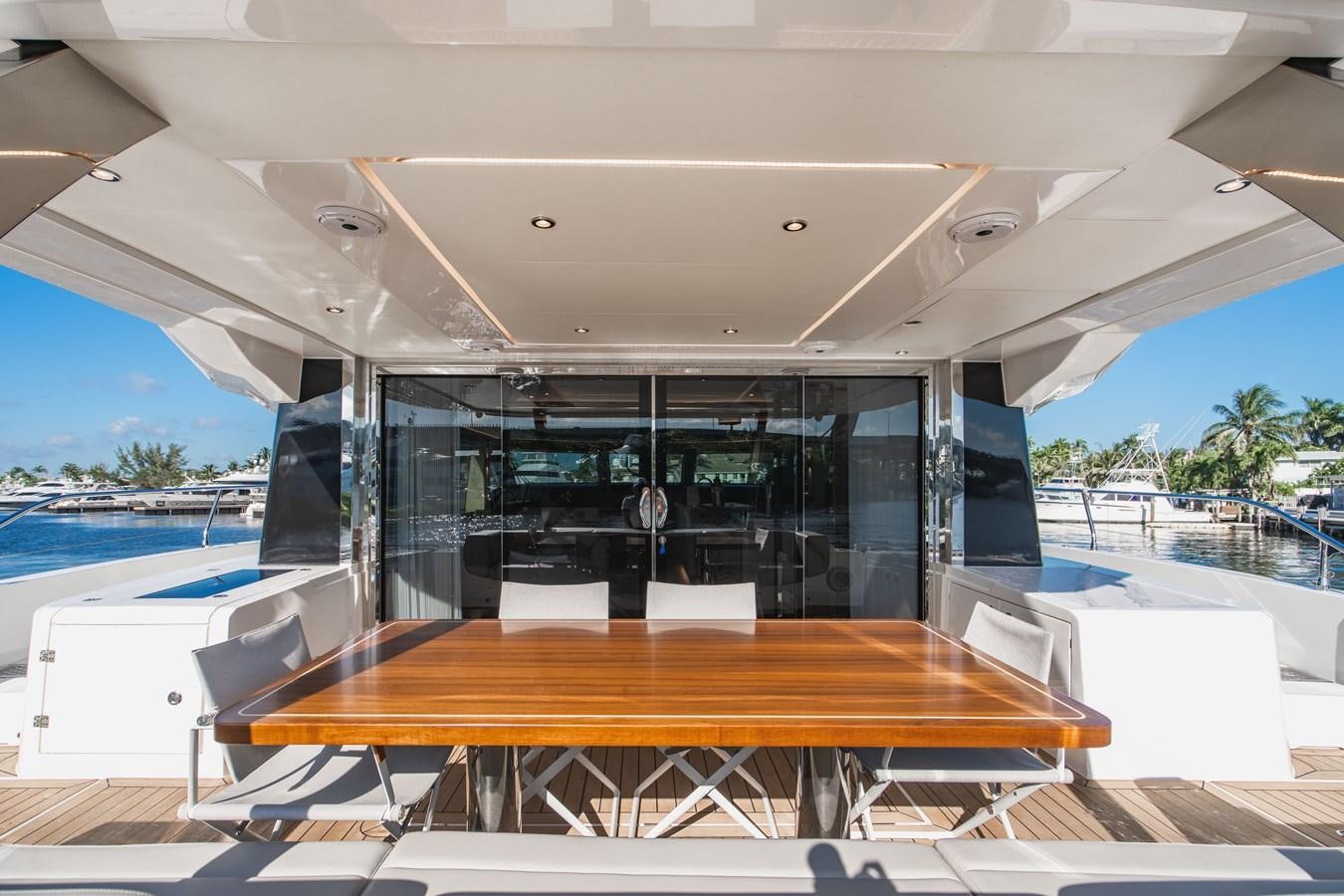 a table on a boat aboard PLANE TO SEA Yacht for Sale