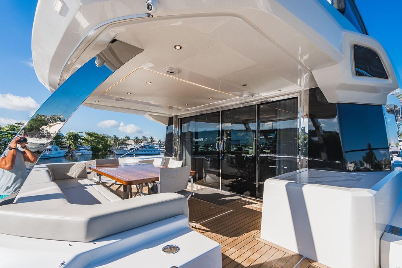 a room with a large glass window aboard PLANE TO SEA Yacht for Sale