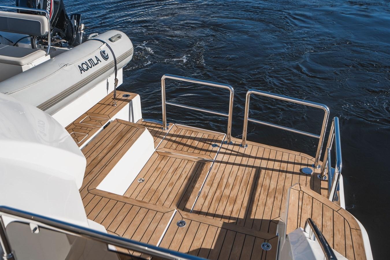 a boat on the water aboard PLANE TO SEA Yacht for Sale