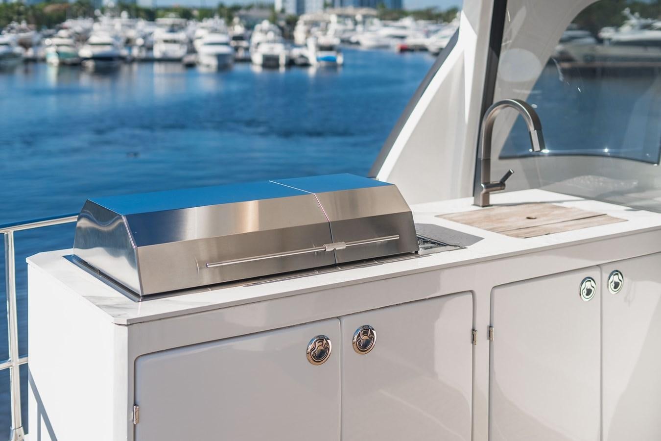 a sink with a faucet aboard PLANE TO SEA Yacht for Sale