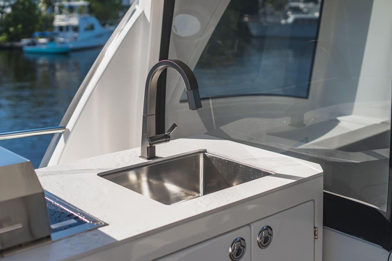a sink on a boat aboard PLANE TO SEA Yacht for Sale