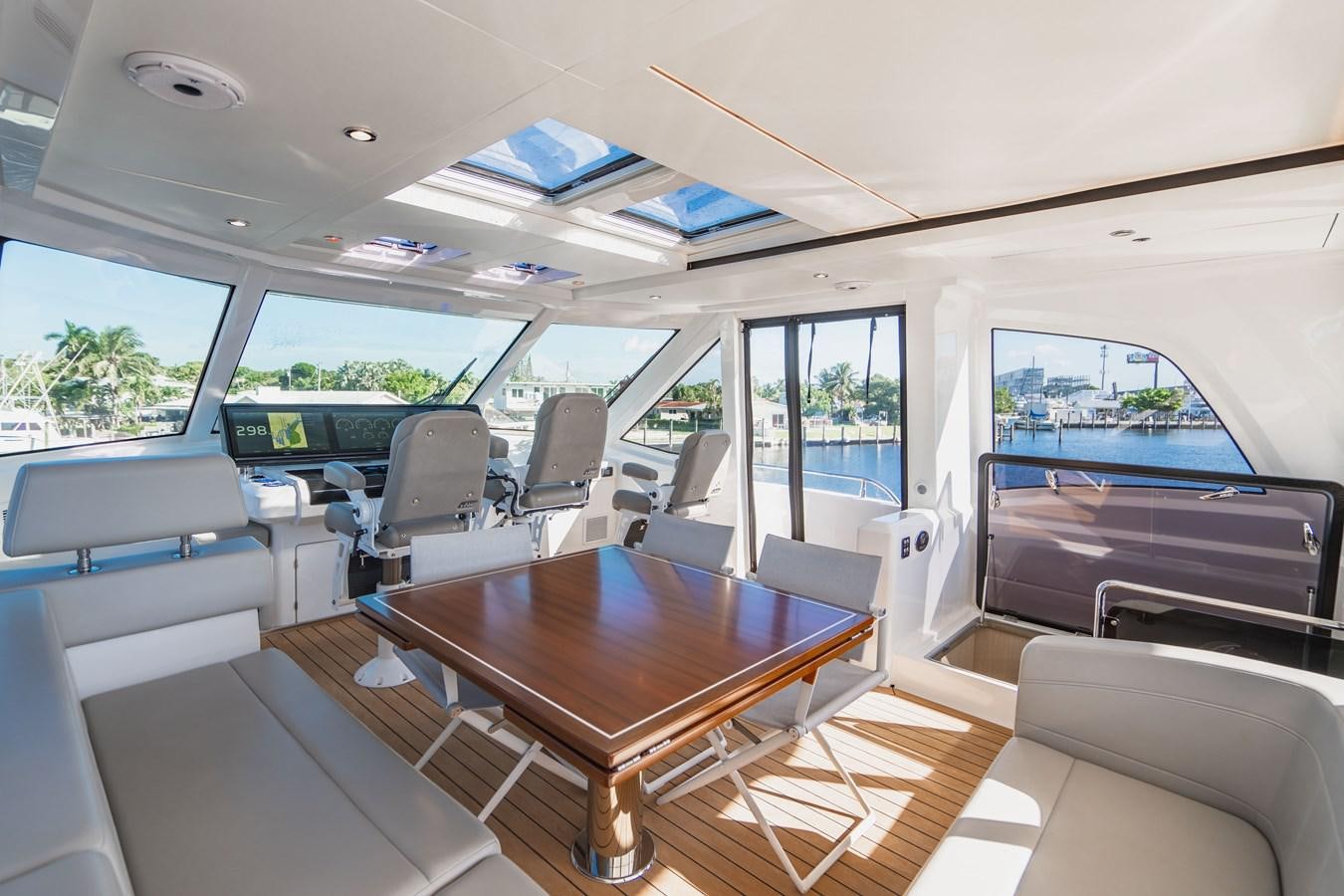 inside of a car aboard PLANE TO SEA Yacht for Sale
