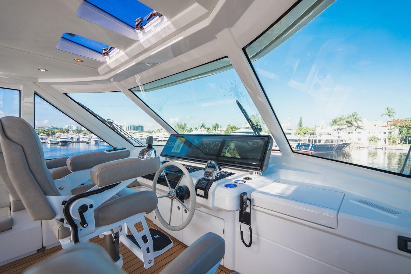 inside of a car aboard PLANE TO SEA Yacht for Sale
