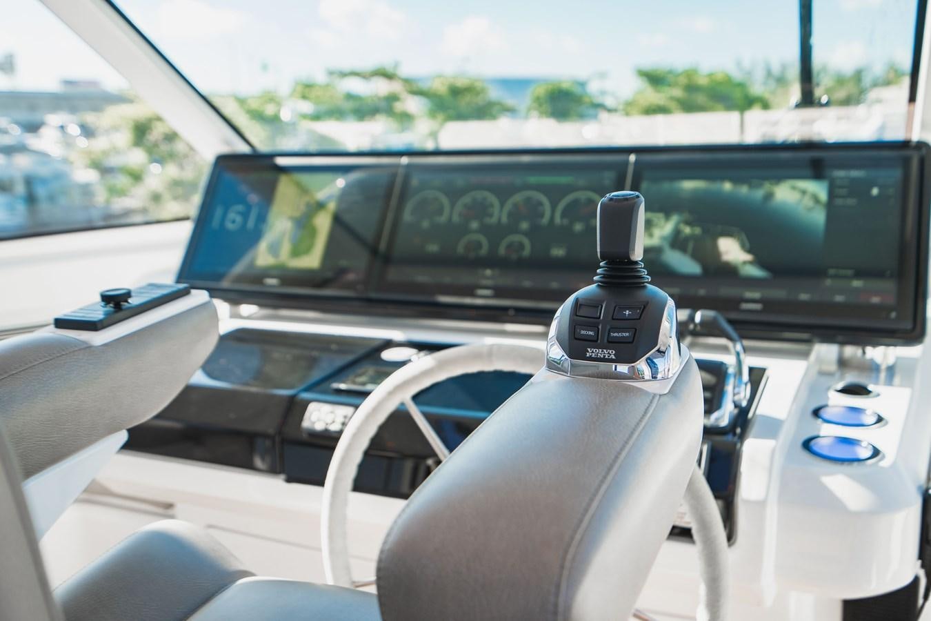 inside of a car aboard PLANE TO SEA Yacht for Sale