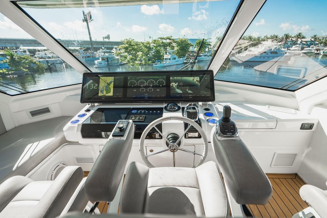 inside of a car aboard PLANE TO SEA Yacht for Sale