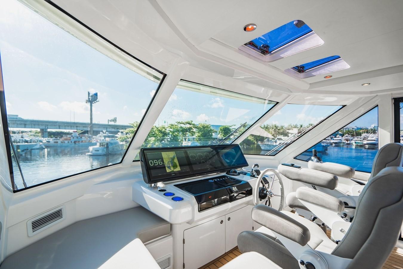 inside of a car aboard PLANE TO SEA Yacht for Sale