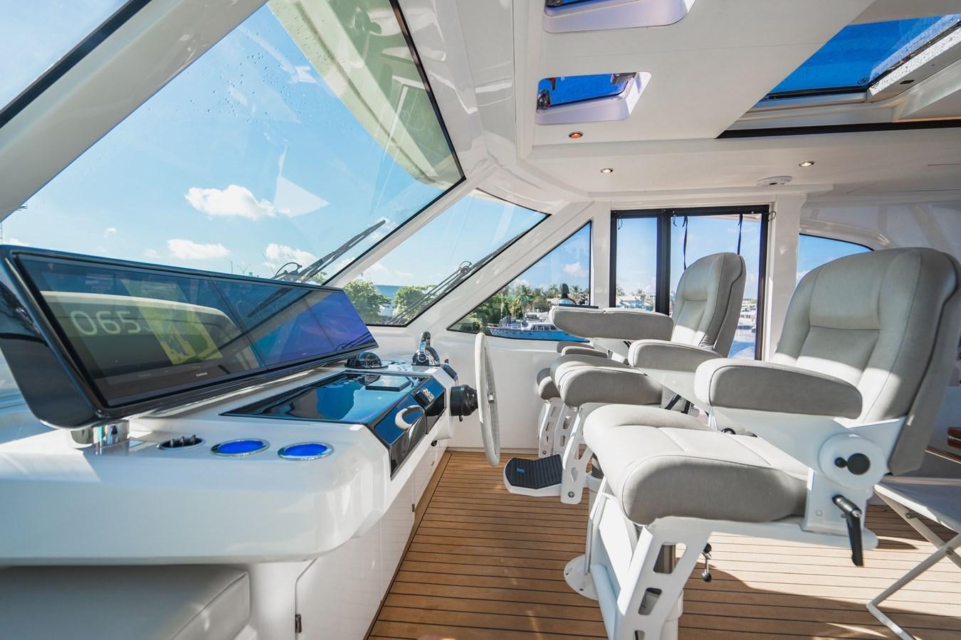 inside of a car aboard PLANE TO SEA Yacht for Sale
