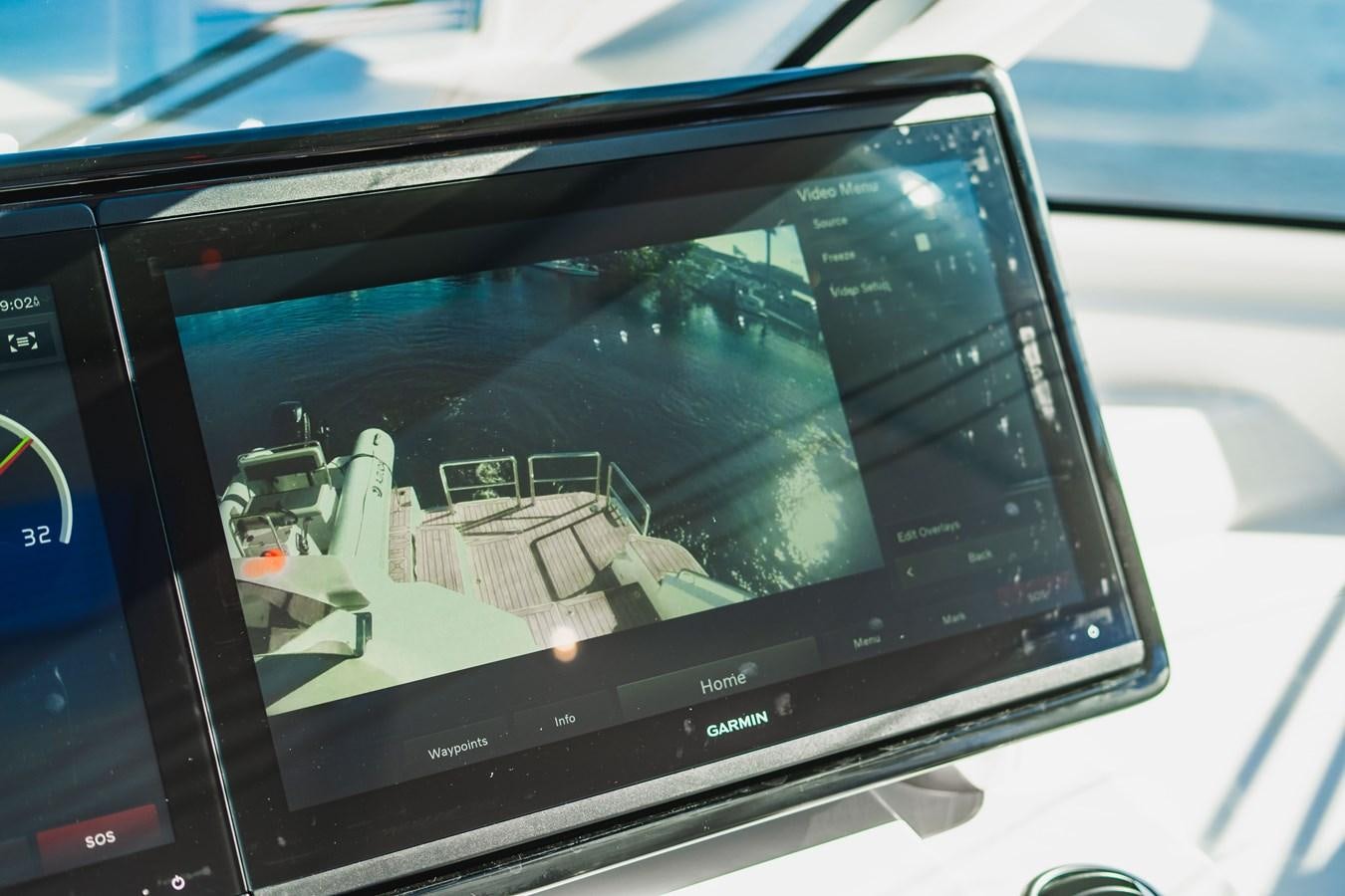 a close-up of a tablet aboard PLANE TO SEA Yacht for Sale