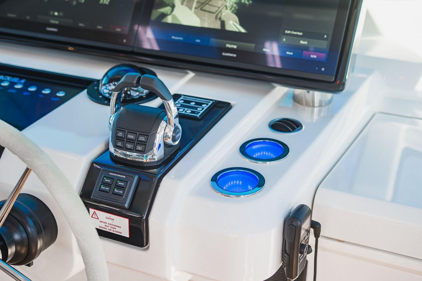 a car with a keychain on the front aboard PLANE TO SEA Yacht for Sale