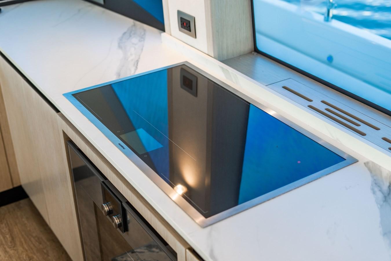 a close-up of a computer aboard PLANE TO SEA Yacht for Sale